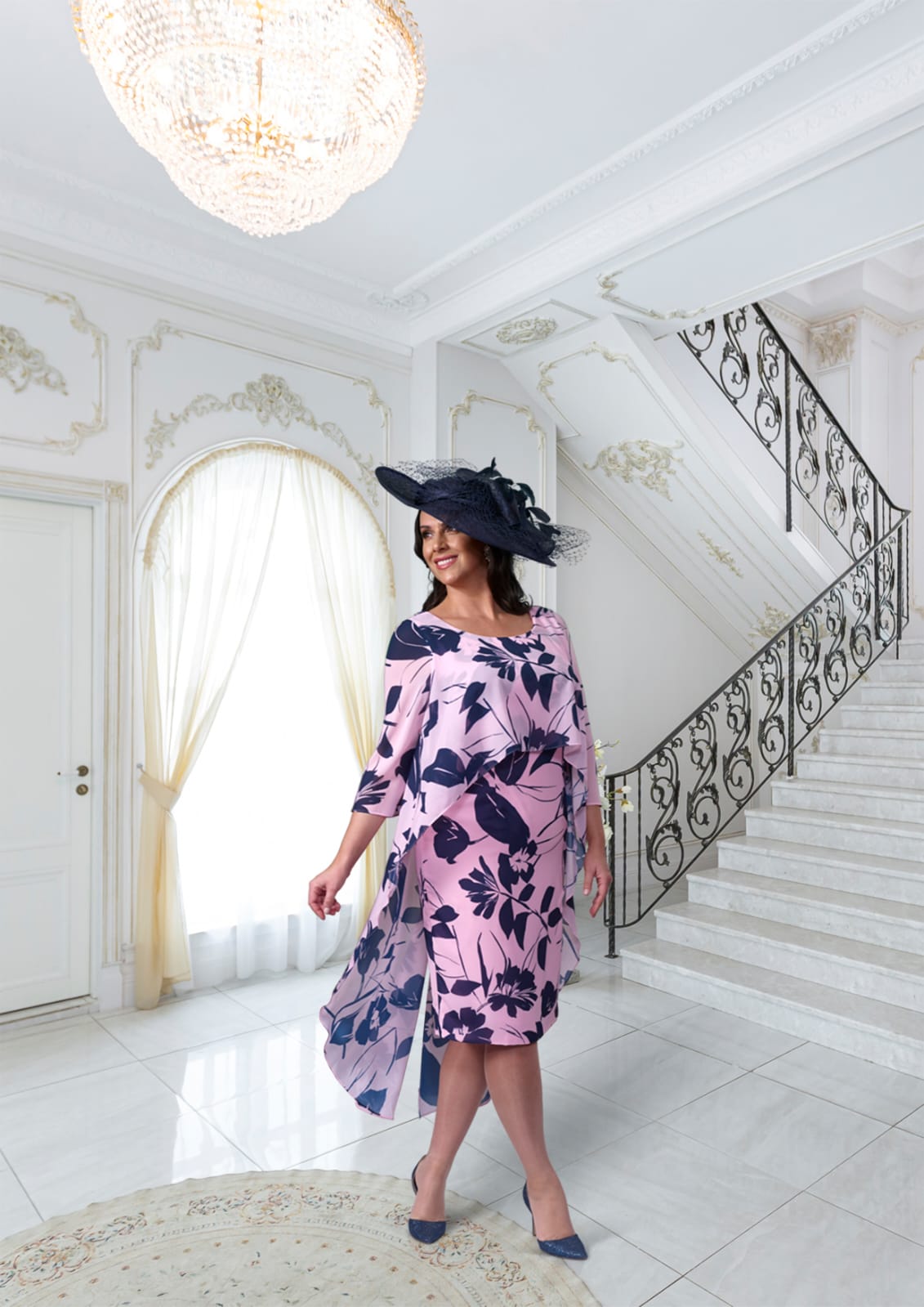 Mother of the bride dresses from Beautiful in Curves. Based in Ashford, Kent but serving all surrounding areas including Canterbury and Maidstone. Flattering mother of the bride and groom dress in a catching print, flowing chiffon layers.
